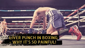 A boxer in pain after being punched in the liver.